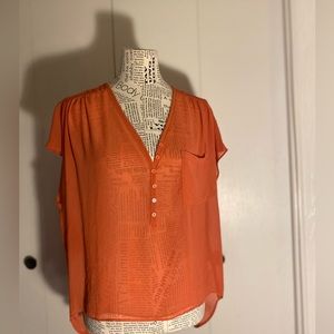 Sheer orange blouse